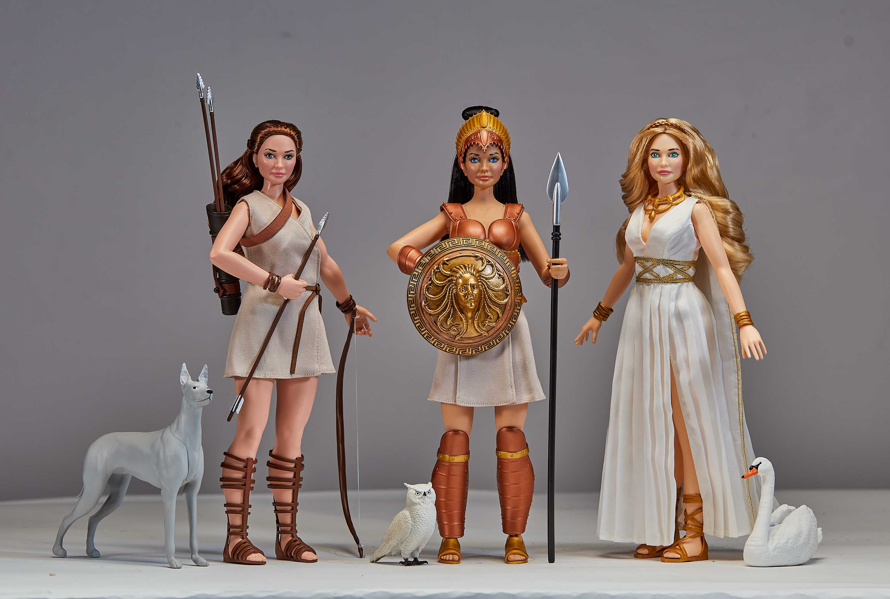 Olympia Dolls Athena, Artemis, and Venus on a grey background