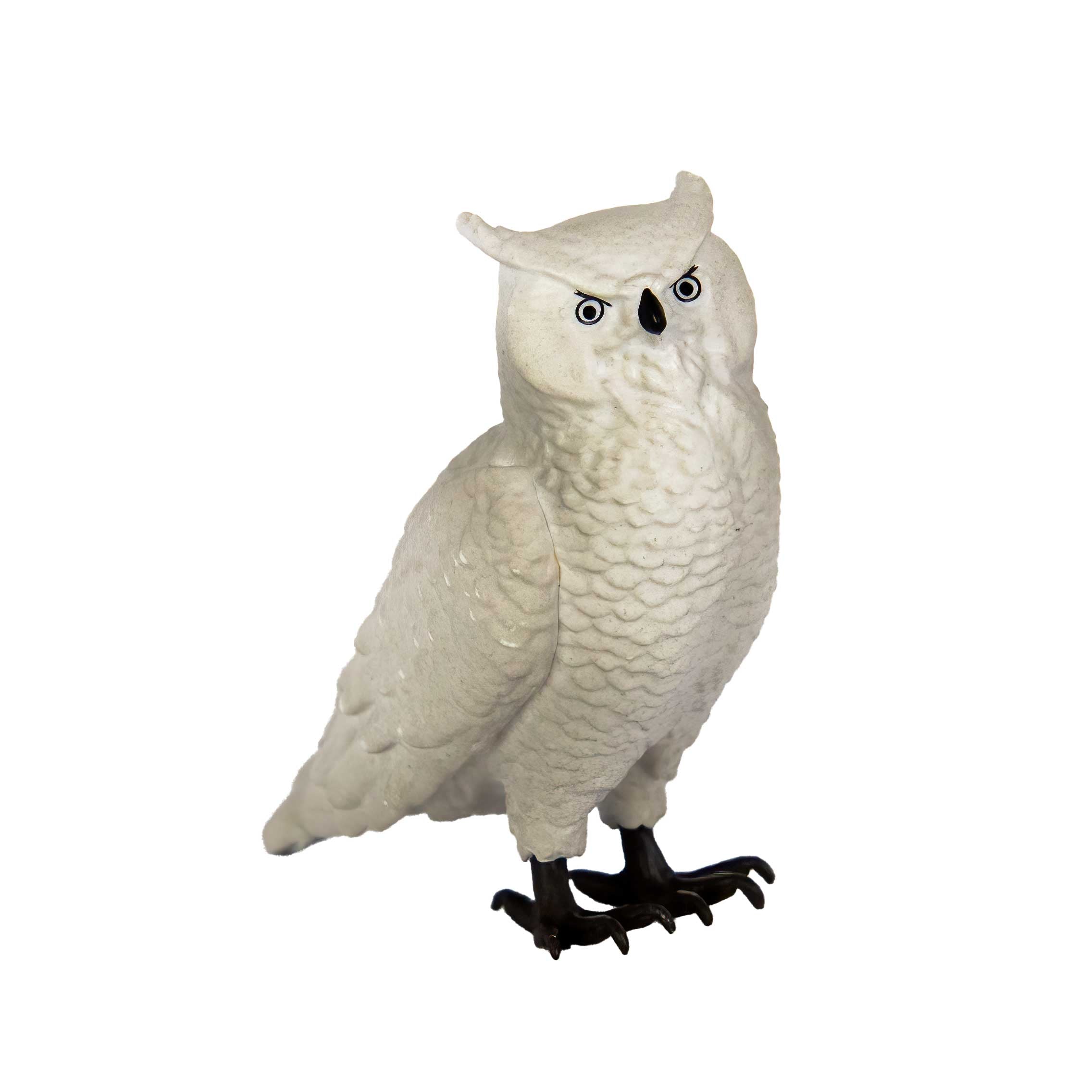 White owl figurine on a white background